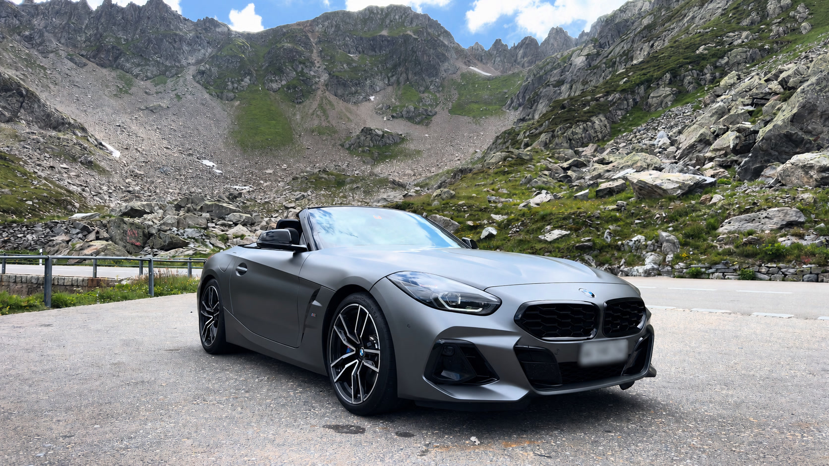 BMW Z4 below the granite walls of Susten Pass